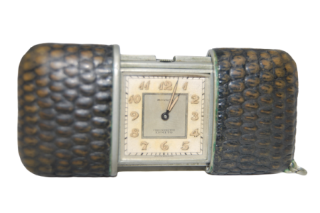 Relógio de viagem Movado Vintage de corda manual corrediça dos anos sessenta.